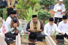 Kapolres Kampar Hadir Amankan Ziarah Kubur & Ayi Ayo Onam, 5000 Warga Ikut Berpartisipasi